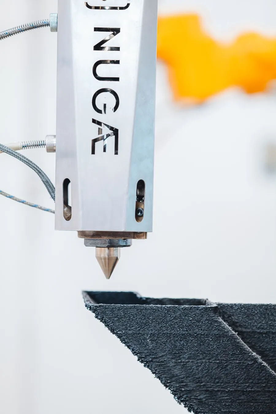 The patented NUGAE extruder printing a large-format component
