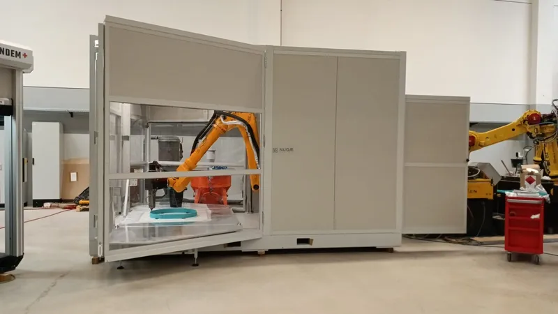 The NU-Mobile cell with its doors open, ready to print