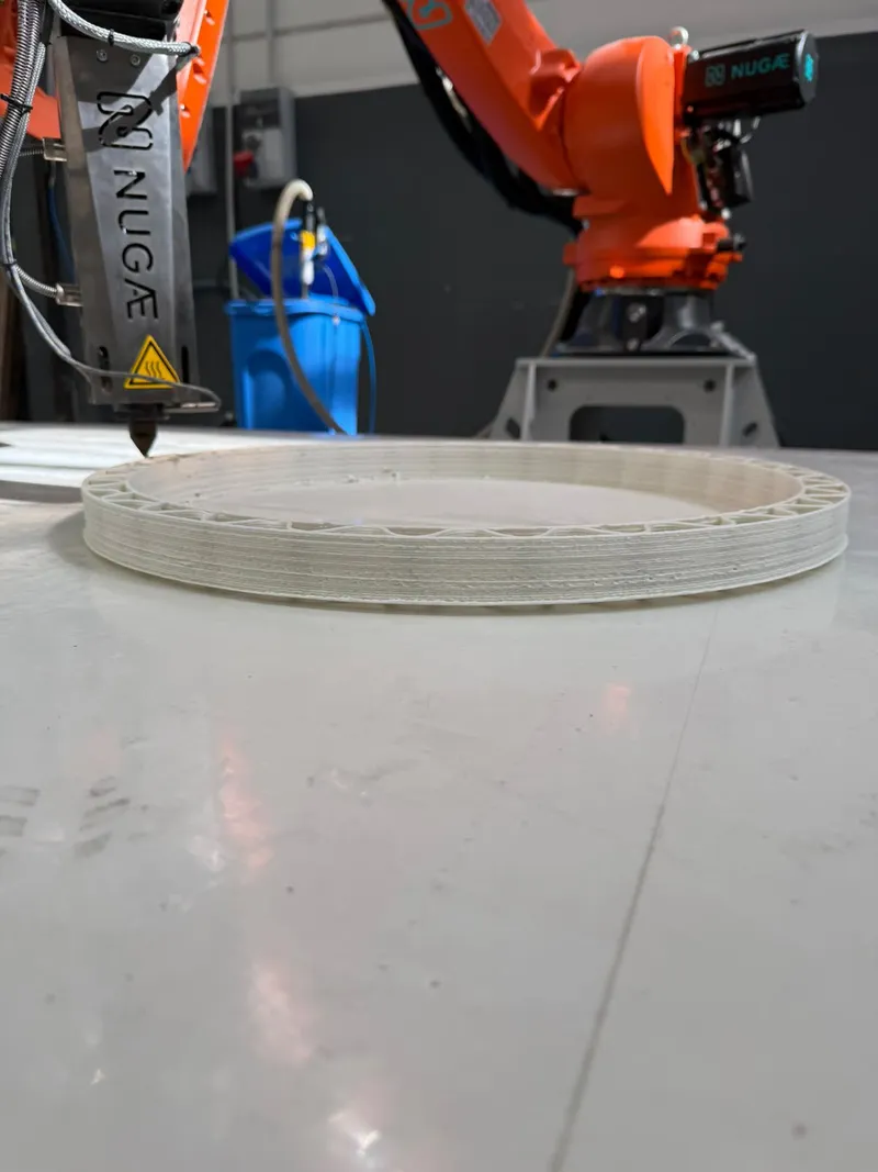 3D-printed ring with visible corrugated structure